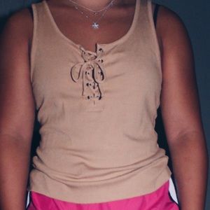 Tied tan colored tank